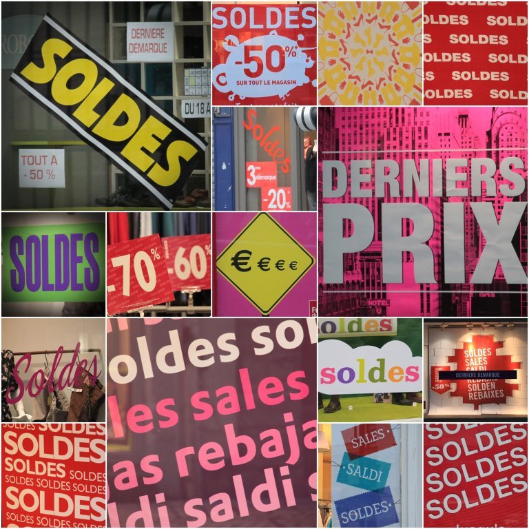 Les soldes s'affichent aux vitrines